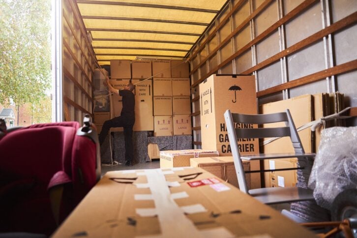 Removal company helping a family move out of their old home