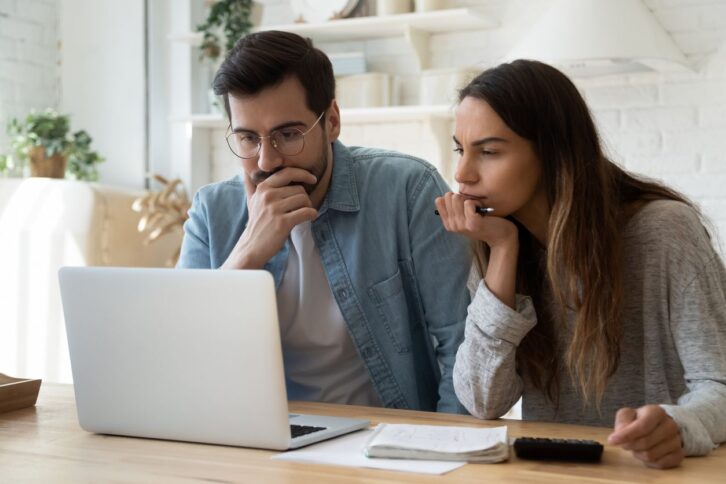 couple looking at computer screen