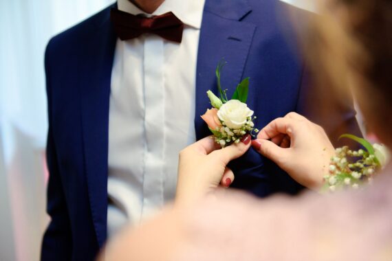 Groom's wedding accessories. Bow tie, suit, cufflinks, belt and shoes.
