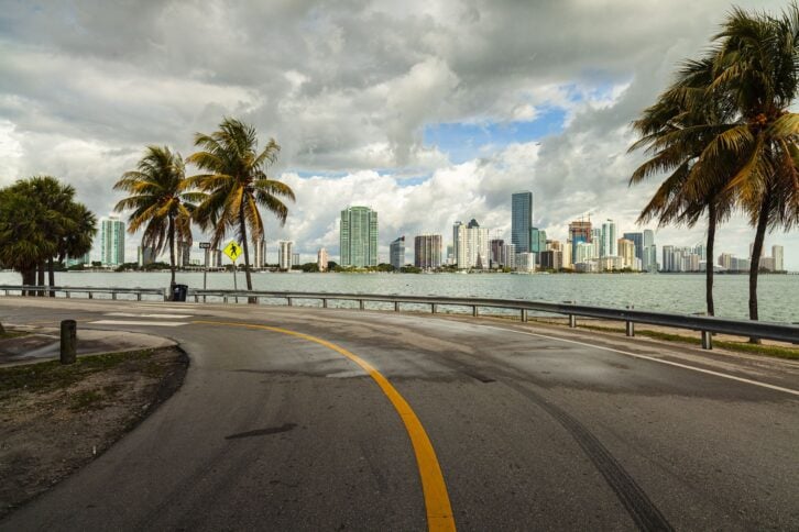 Beautiful Miami skyline along Biscayne Bay with rain clouds.