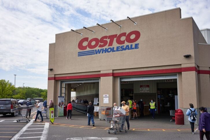 Tigard, OR, USA - May 5, 2020: Masked shoppers outside a Costco store in Tigard, Oregon. Costco updated its coronavirus response and implemented face covering policy in stores on Monday.