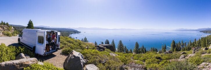 A Young Couple Parked Van at a Viewpoint of Lake Tahoe