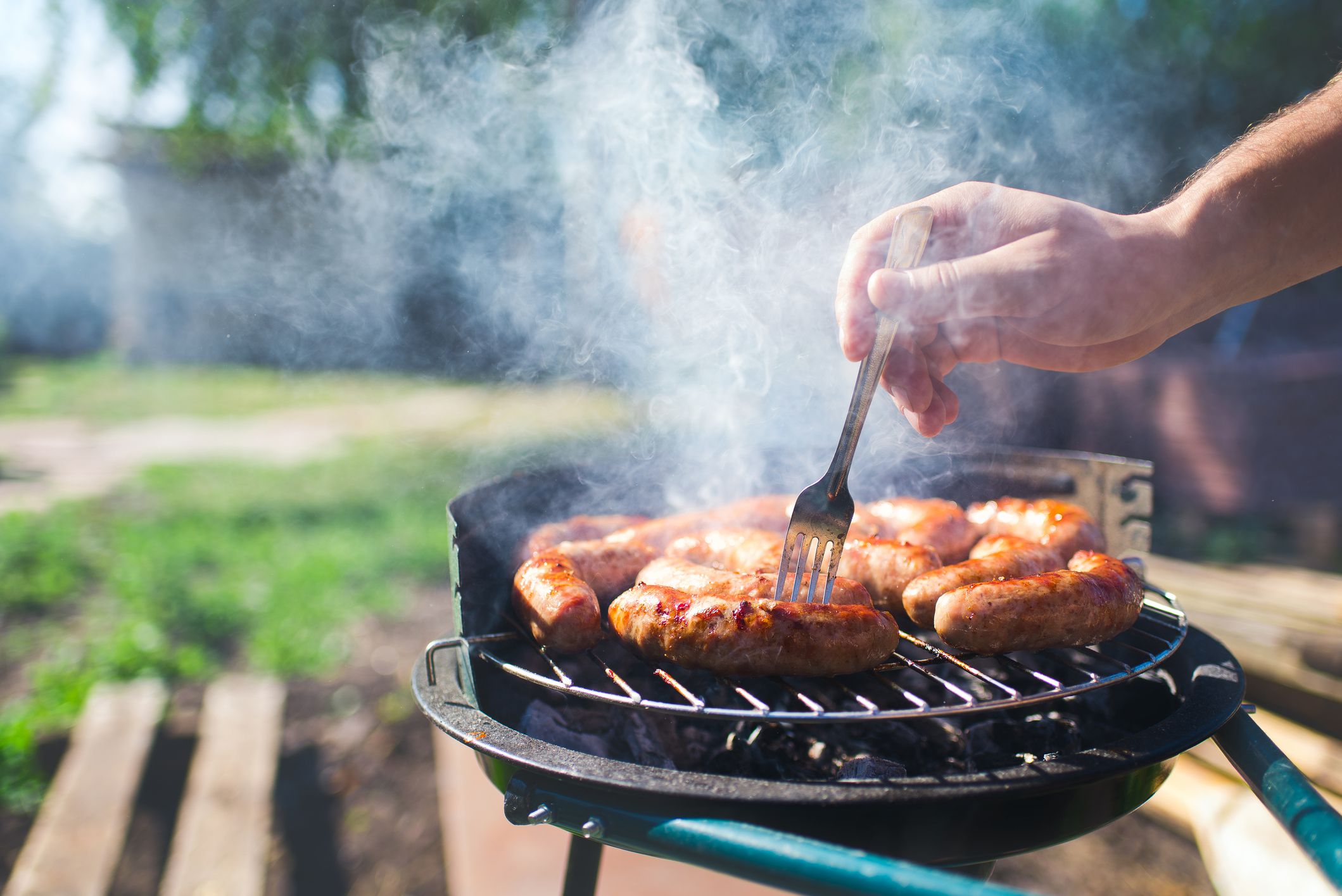 Food. BBQ outside . Sausages are fried on the grill.