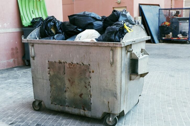 waste management system in public perspective. huge rubbish bin for garbage