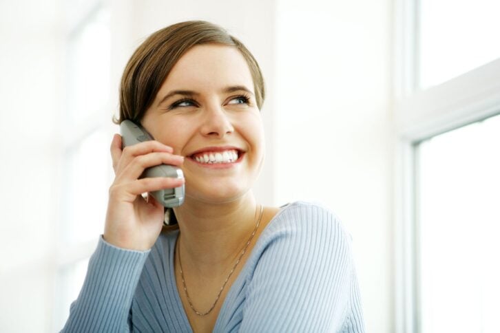 young woman on cordless phone