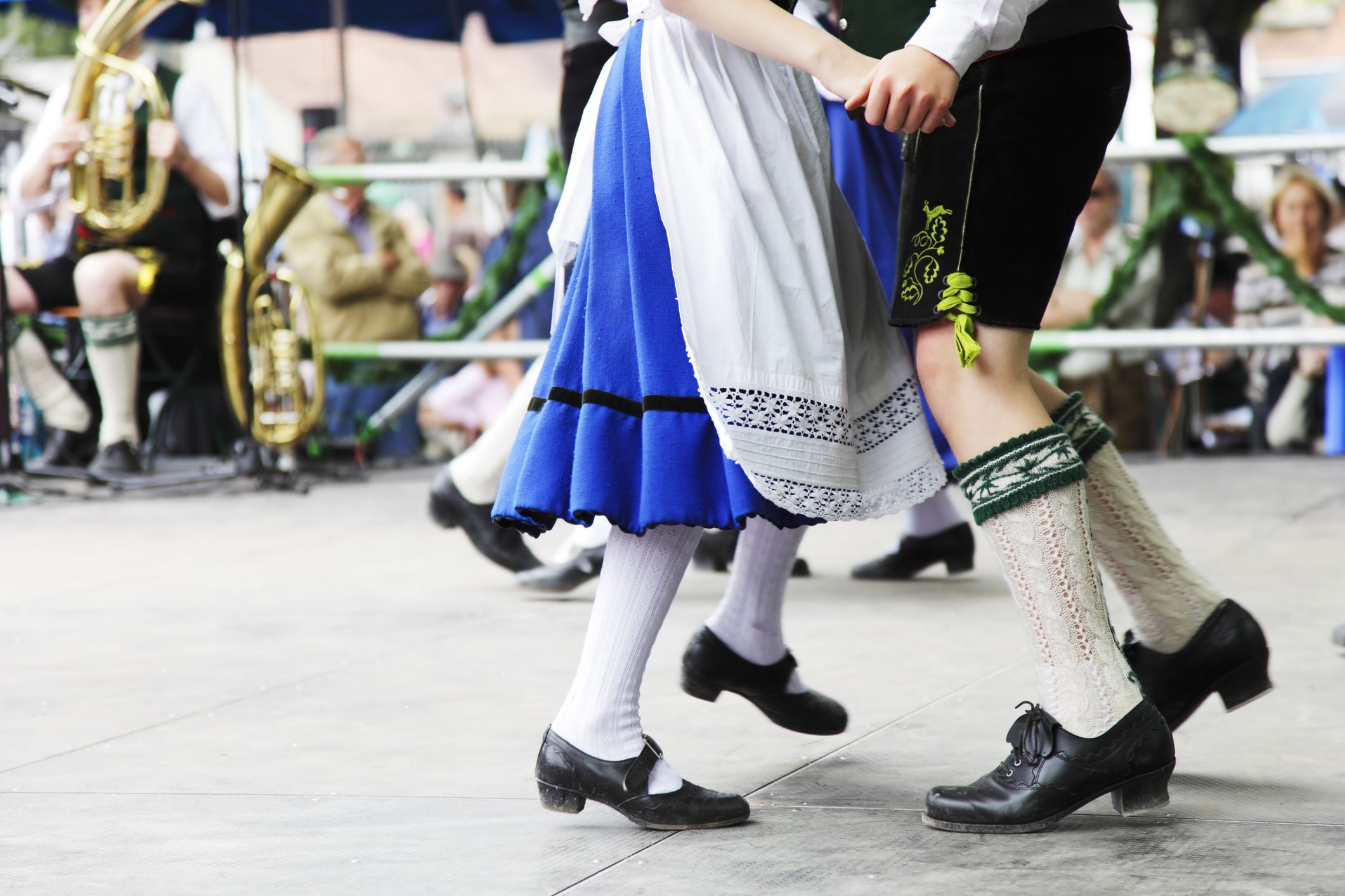 bavarian couple dancing at oktoberfest
