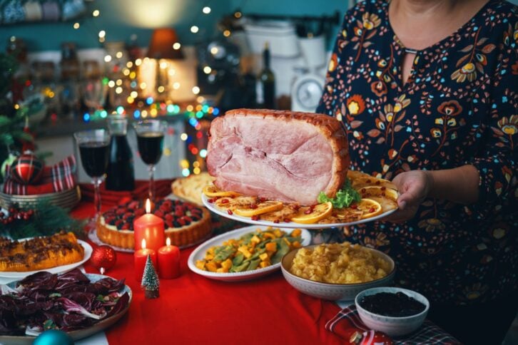 Christmas Dinner with Baked Glazed Ham with Mashed Potatoes, Green Beans, Radicchio Salad and Berry Pie