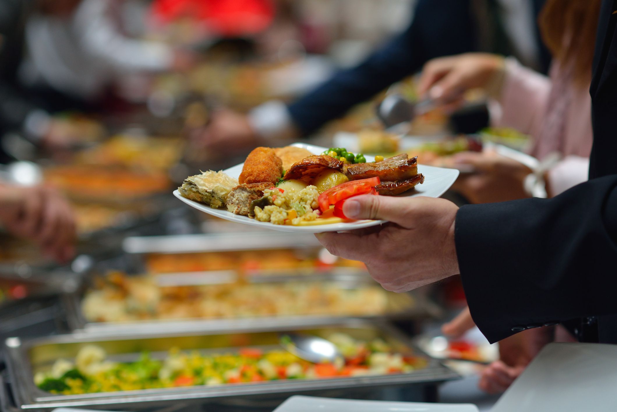 people group catering buffet food indoor in luxury restaurant with meat colorful fruits and vegetables