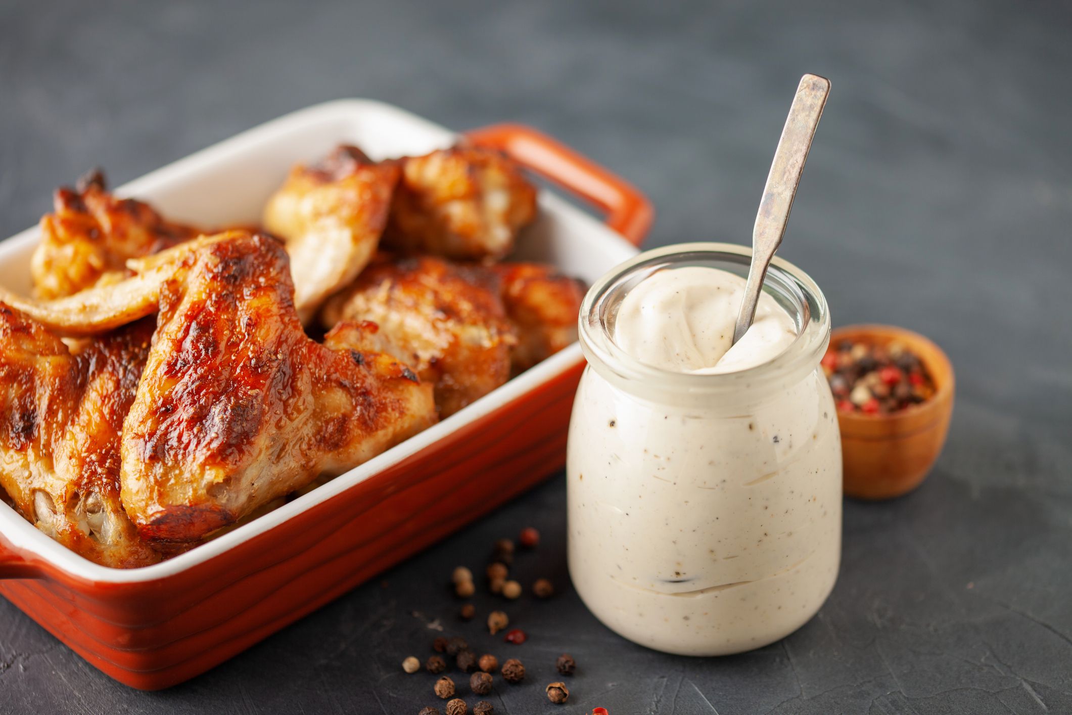Alabama white BBQ sauce in bowl and ingredient for dip .