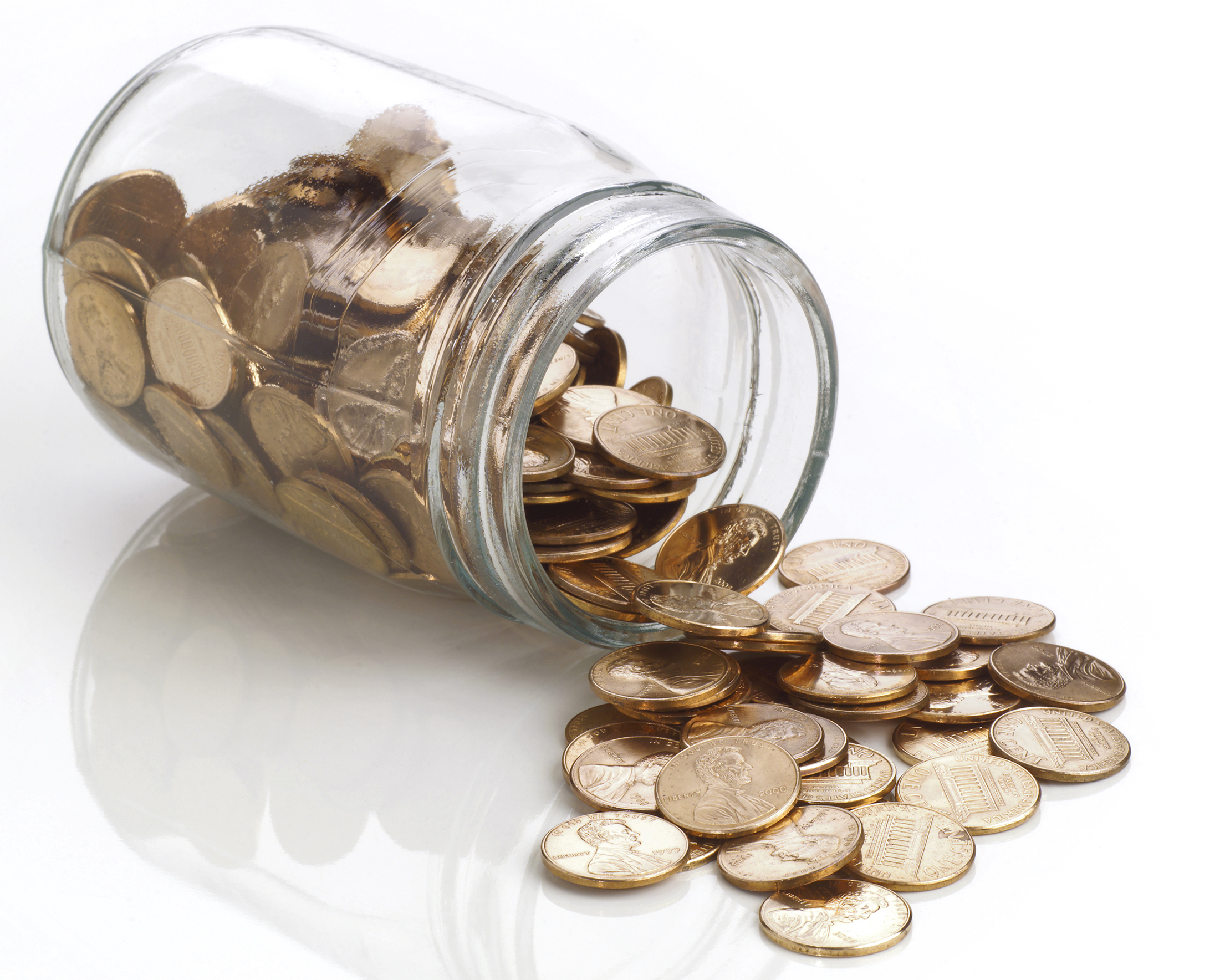 jar of polished US pennies spilling out