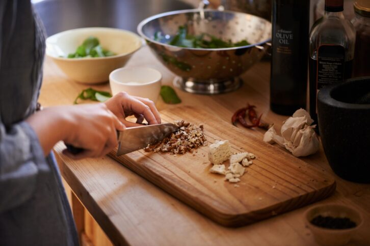 woman chopping ingredients for cooking
