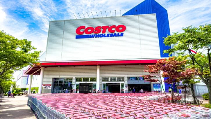 Front entrance view of a Costco Korea Warehouse in Busan on a sunny day