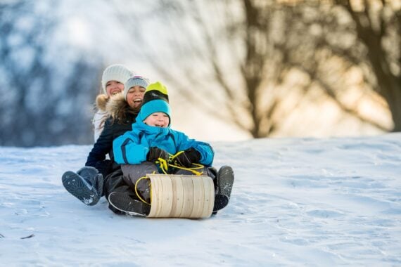 Kids having fun on the tobbogan hill
