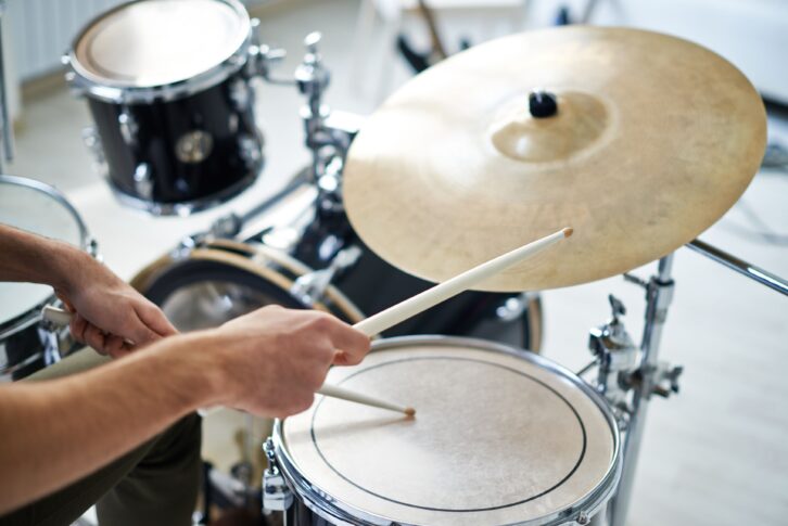 person playing drums