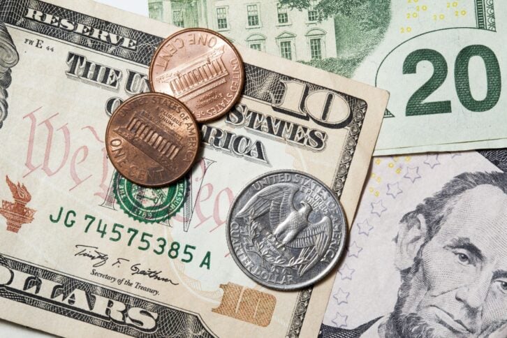 ten,twenty,five dollar bill and coins