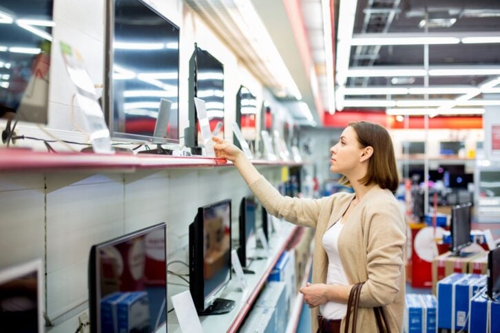 woman buys the TV