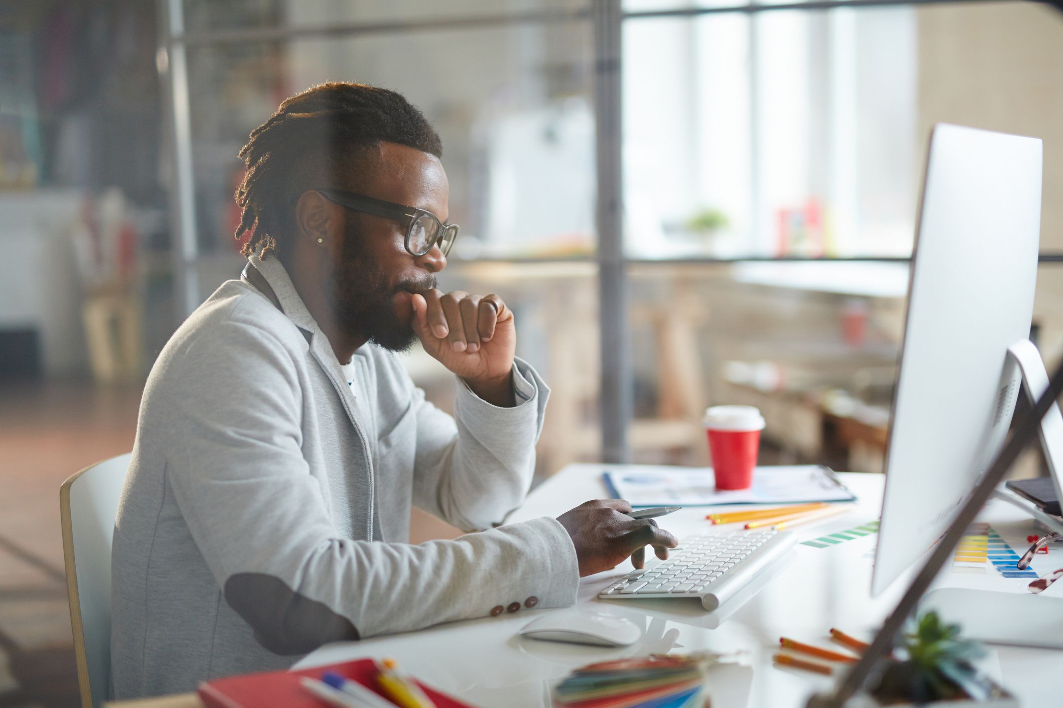 Man designer working at computer