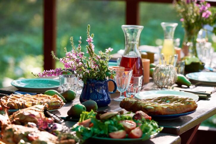 Festive table with food and drinks on it