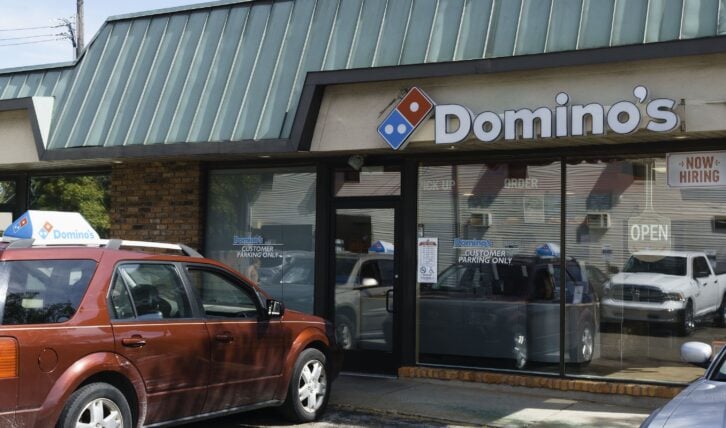 Rochester, Michigan, USA - September 16, 2016: A Domino's Pizza location in Rochester. Founded in Ann Arbor, Domino's has locations across the US and in 81 countries internationally.