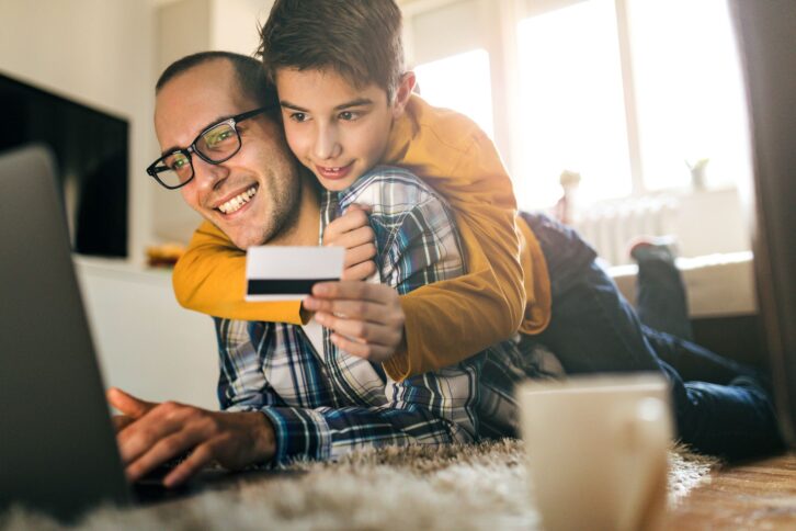 Photo of father with son online shpping