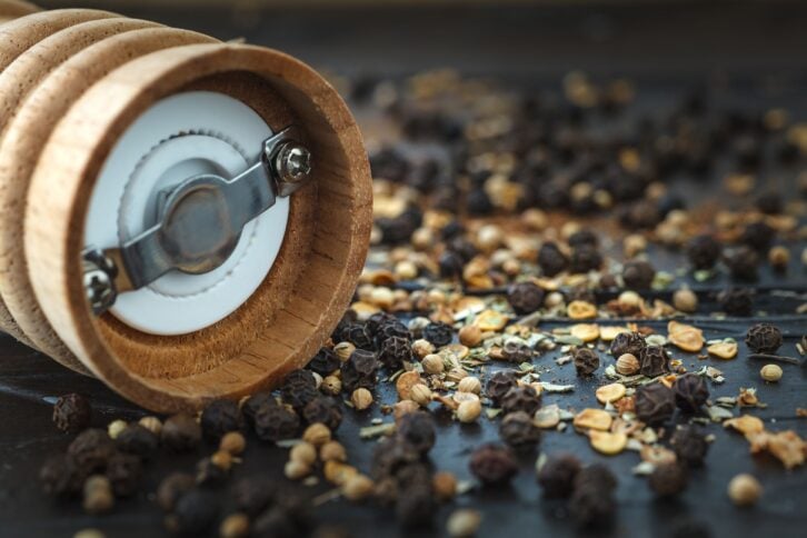 spices amongst a pepper mill