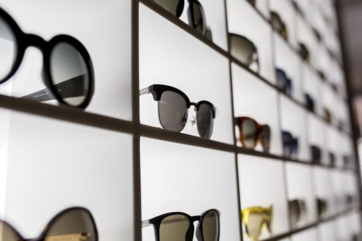sunglasses on a display case at the optics shop