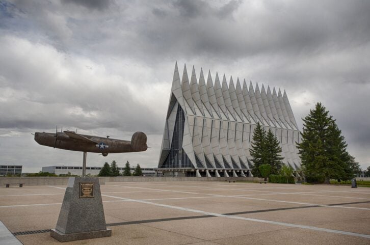 US Air Force Academy, Colorado - Sep 22, 2017: A B24 bomber model in front of the famous Cadet Chapel