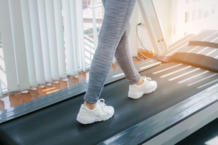 woman on a treadmill at home
