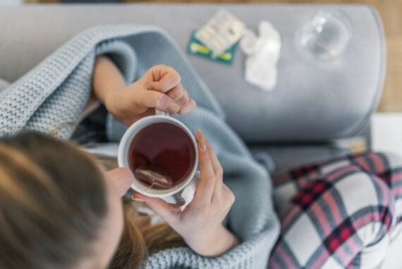 Woman suffering from cold flu