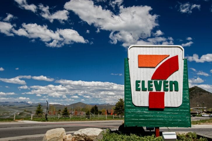 Park City, UT, May 12, 2017: 7-Eleven sign against a picturesque landscape is brightly lit by the sun.