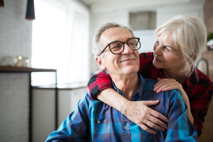 senior couple looking at each other playfully