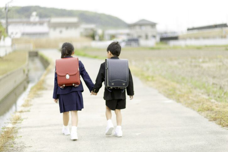 schoolchildren in Japan walking to school with randoseru