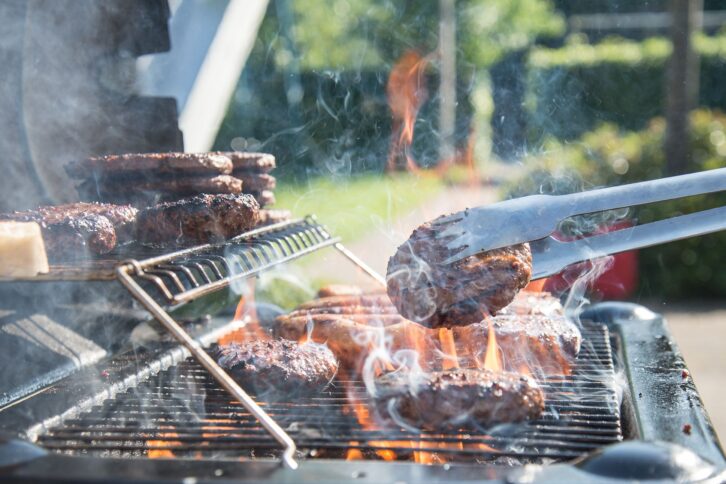 grill cooking hamburgers and other meat