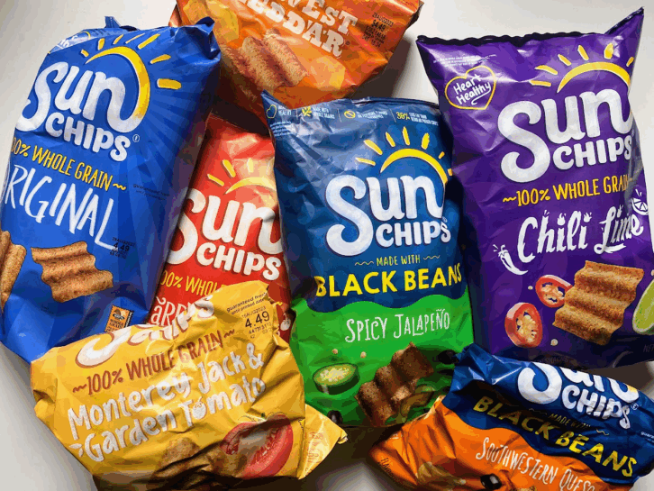 A pile of different bags of SunChips