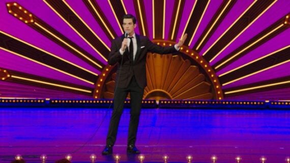 john mulaney on stage performing kid gorgeous
