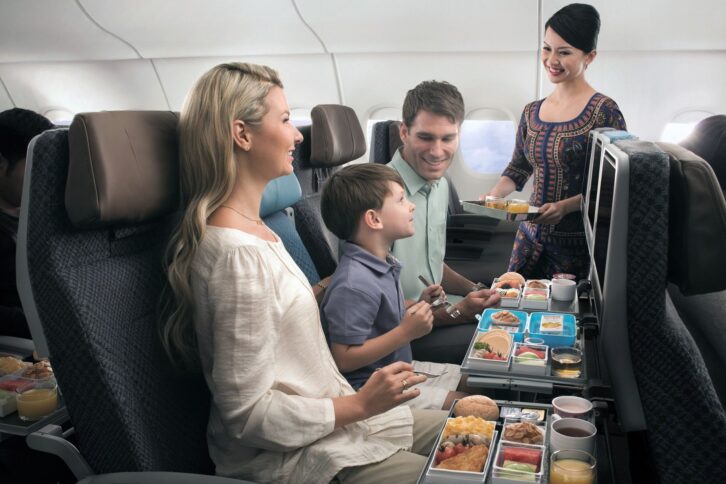 family in singapore airlines economy seats