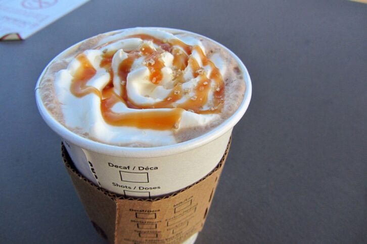 Closeup of top of Starbucks Salted Caramel Mocha with caramel swirl