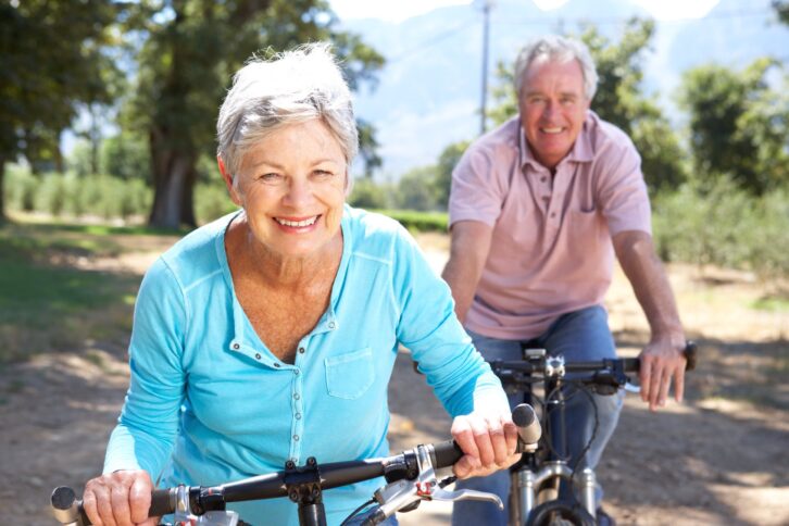 senior couple on country bike ride