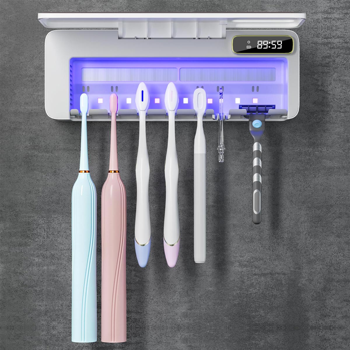 A wall-mounted toothbrush holder with UV light holds five toothbrushes and one razor. Two toothbrushes are electric. A digital clock is on the upper right corner. The background is a dark grey textured wall.