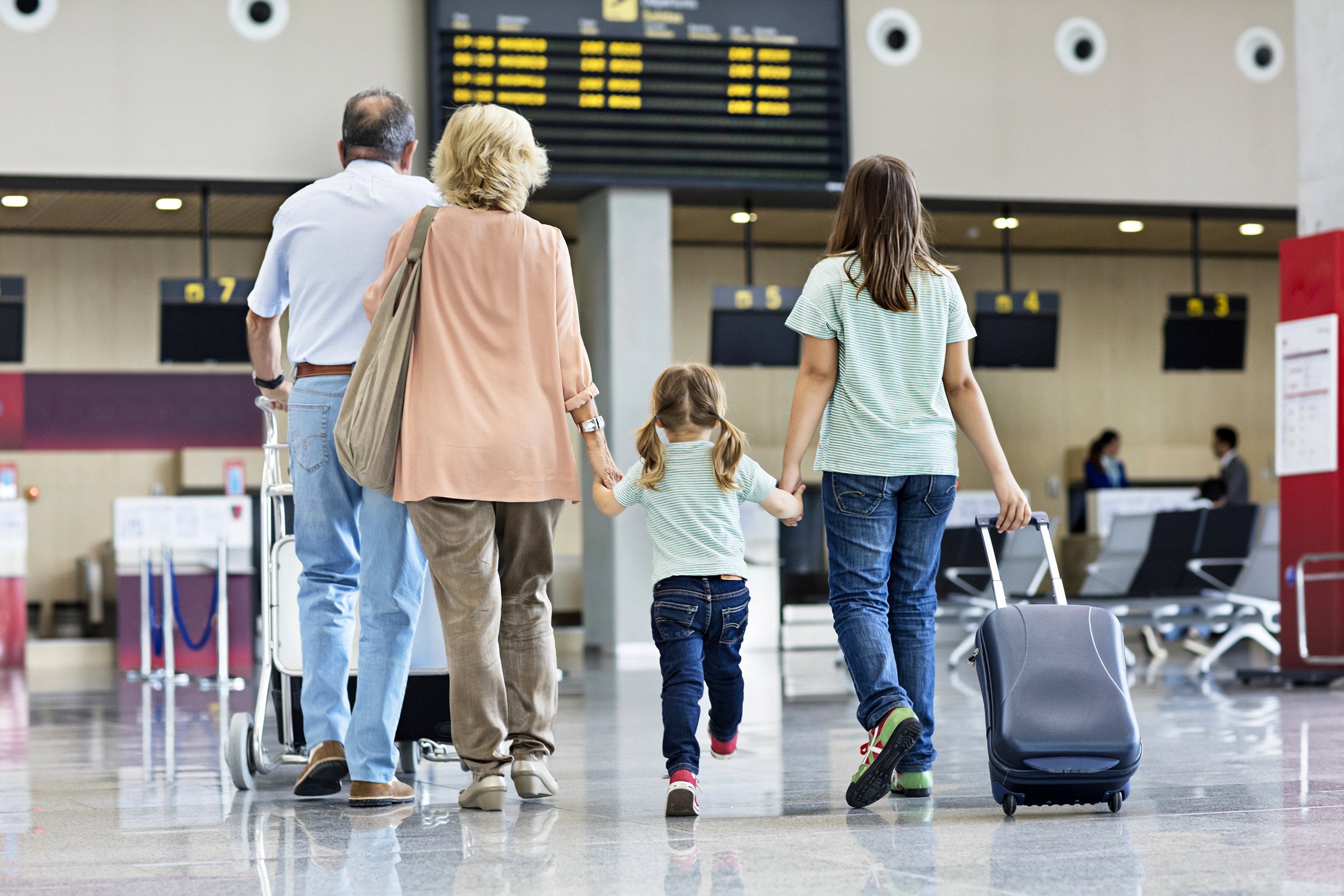 Family traveling in airport