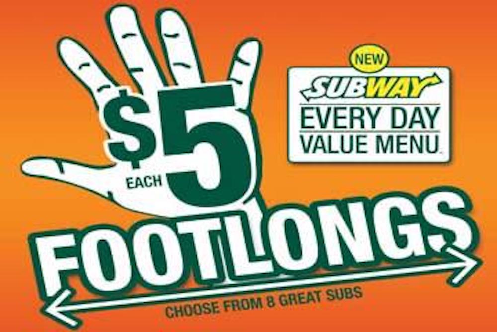 A Subway ad features a large green hand with "$5 each" written on it, promoting "Footlongs" subs. Text reads "EVERY DAY VALUE MENU" and "Choose from 8 great subs" on an orange background.