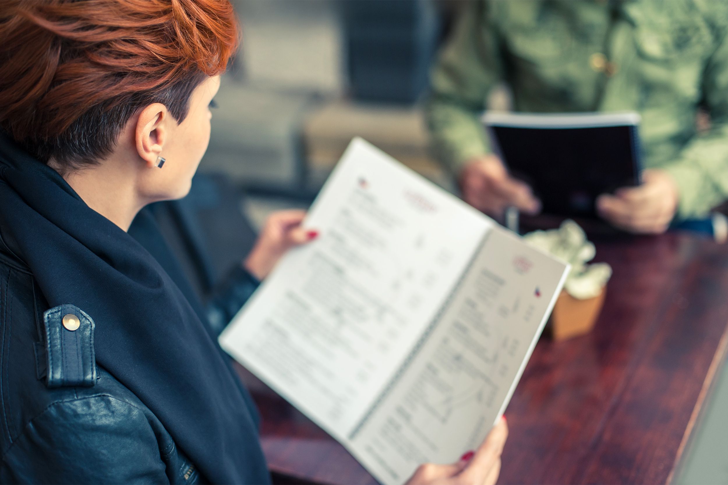 Woman reading menu