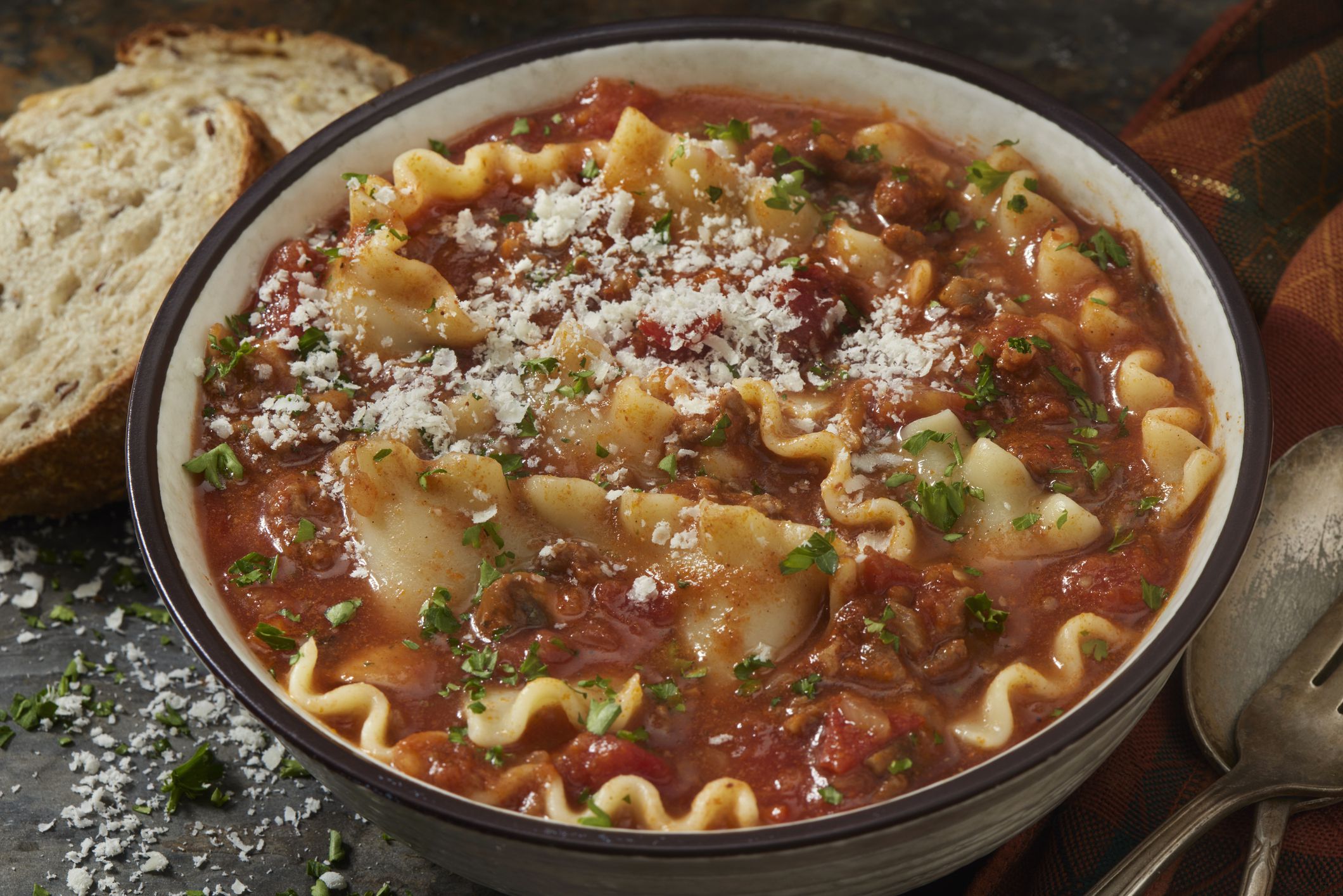 Lasagna Soup with Ground Beef, Parmesan Cheese, Fresh Parsley and French Bread