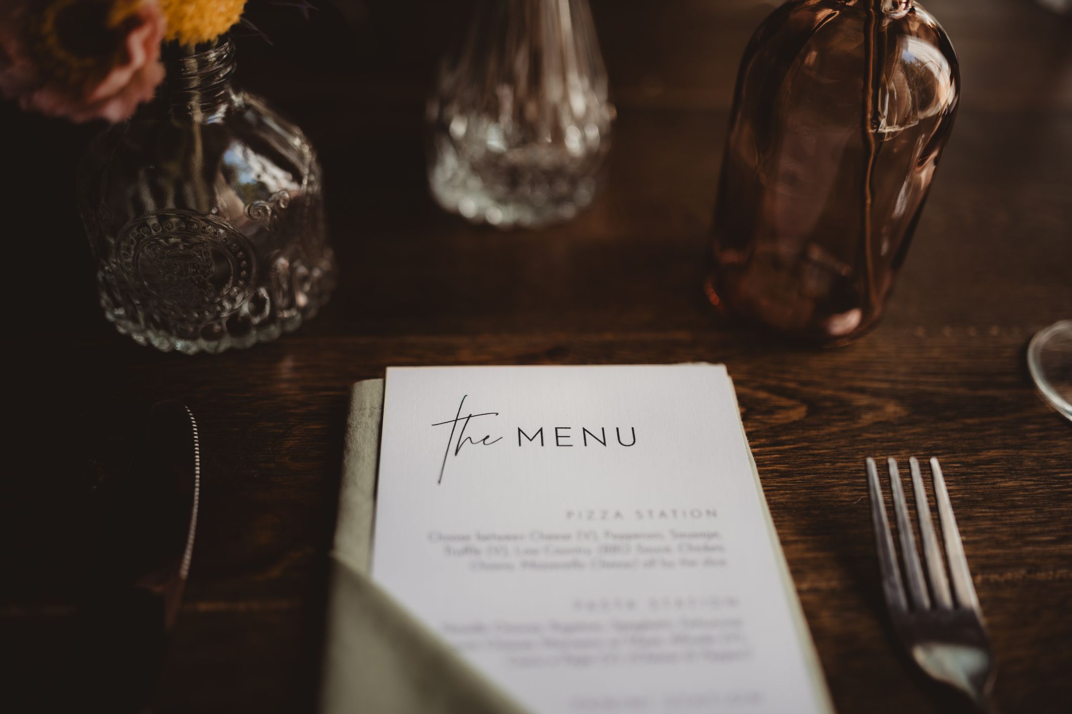 Close up of menu at table setting at wedding reception