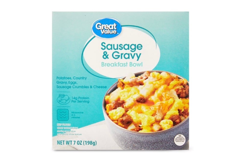 Front of a Great Value Sausage & Gravy Breakfast Bowl box showing an image of the meal with sausage, eggs, and cheese in a bowl. The packaging highlights 14g protein per serving and 7 oz (198g) net weight.