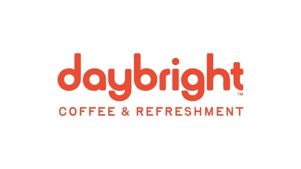 The image shows the "daybright" logo in bold orange lowercase letters, with "COFFEE & REFRESHMENT" written below in uppercase orange letters on a white background.