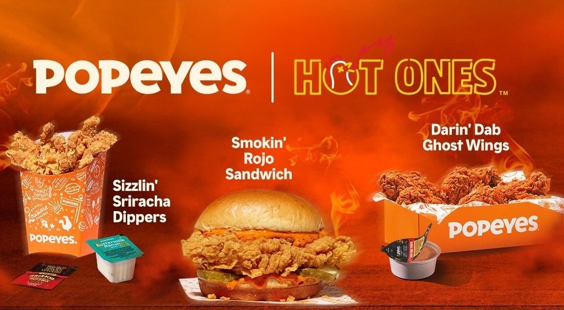 POPEYES and HOT ONES promo image showcases new fast-food favorites: Sizzlin' Sriracha Dippers with sauce, a Smokin’ Rojo Sandwich, and Darin’ Dab Ghost Wings with dipping sauce, all on an orange background with flames.