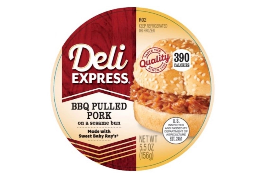 Circular Deli Express BBQ Pulled Pork sandwich package, featuring an image of a pulled pork sandwich on a sesame bun. Text highlights 390 calories, 5.5 oz weight, and Sweet Baby Ray’s sauce.