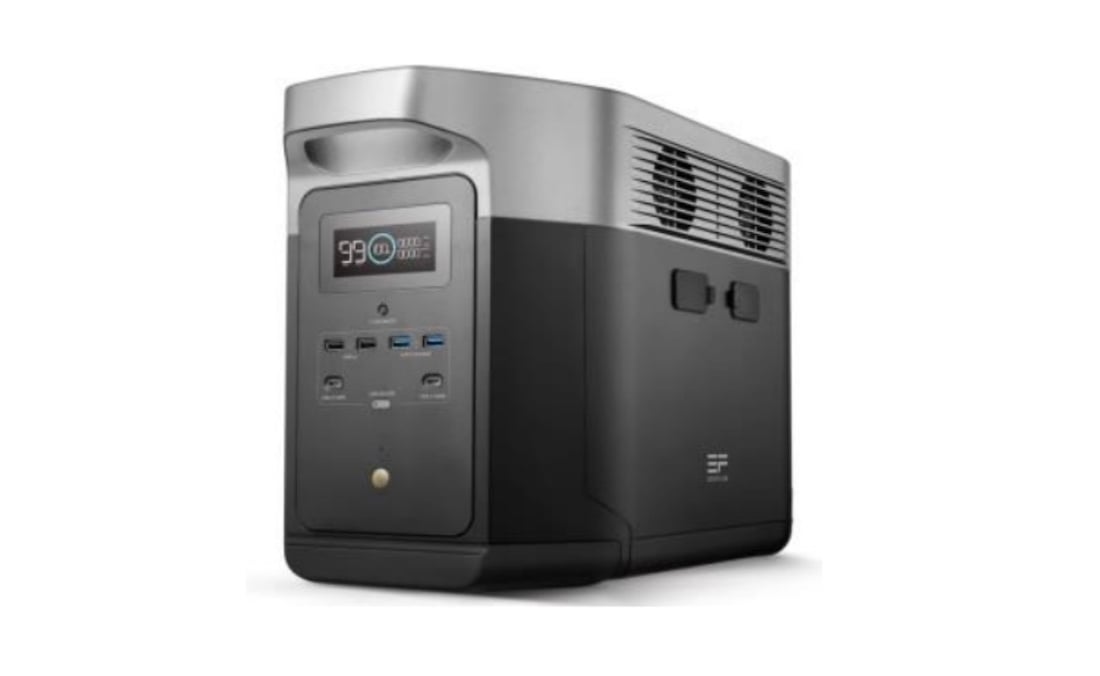 A portable power station with a digital display screen, multiple USB ports, and ventilation grilles, designed in black and silver.