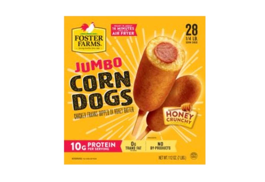 Foster Farms Jumbo Corn Dogs box, featuring an image of two corn dogs, bold text highlighting "Jumbo Corn Dogs," "Honey Crunchy," and nutrition info such as 10g protein per serving and 0g trans fat.